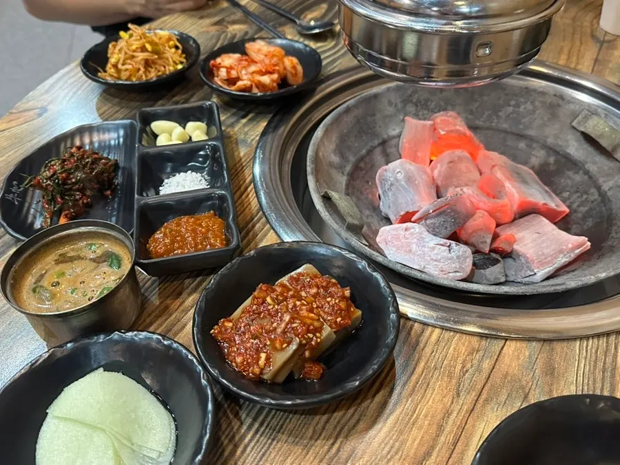 Jeju pork pre-seared and brought out by the owner