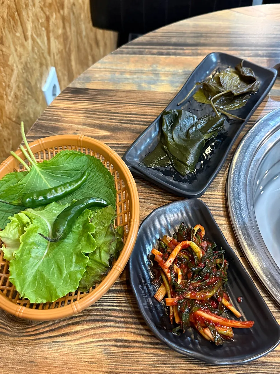 Standard banchan spread at Tamra Factory
