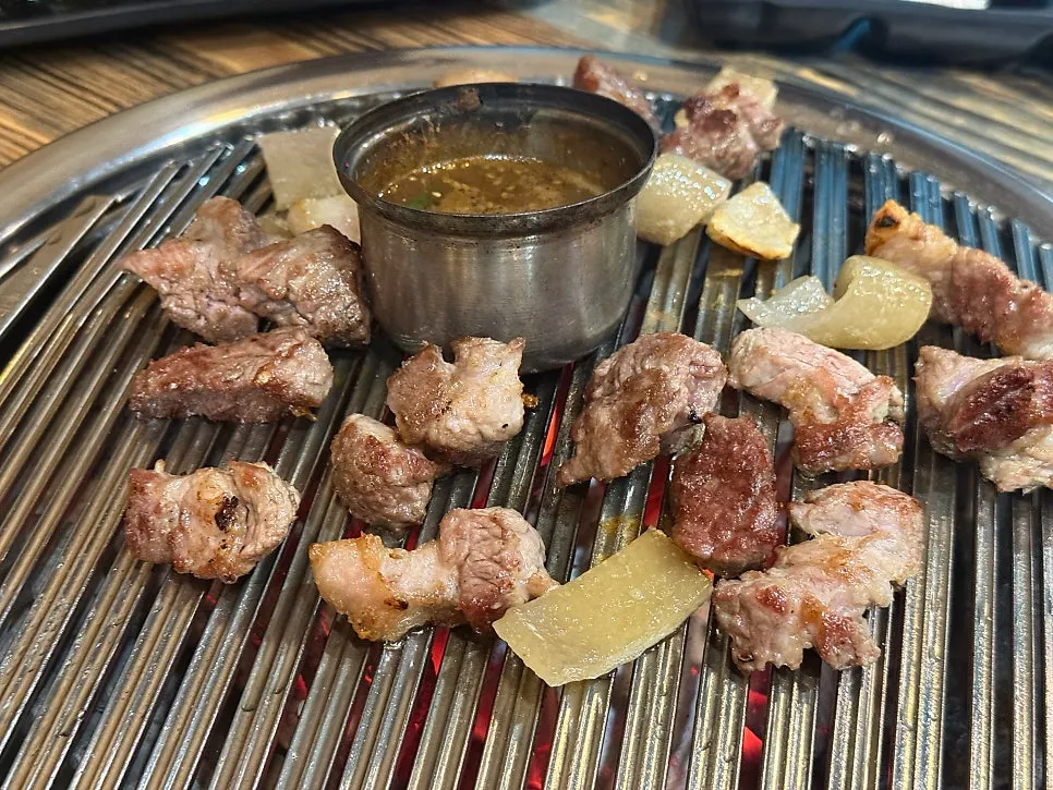 A piece of Jeju pork neck cooked to the right doneness