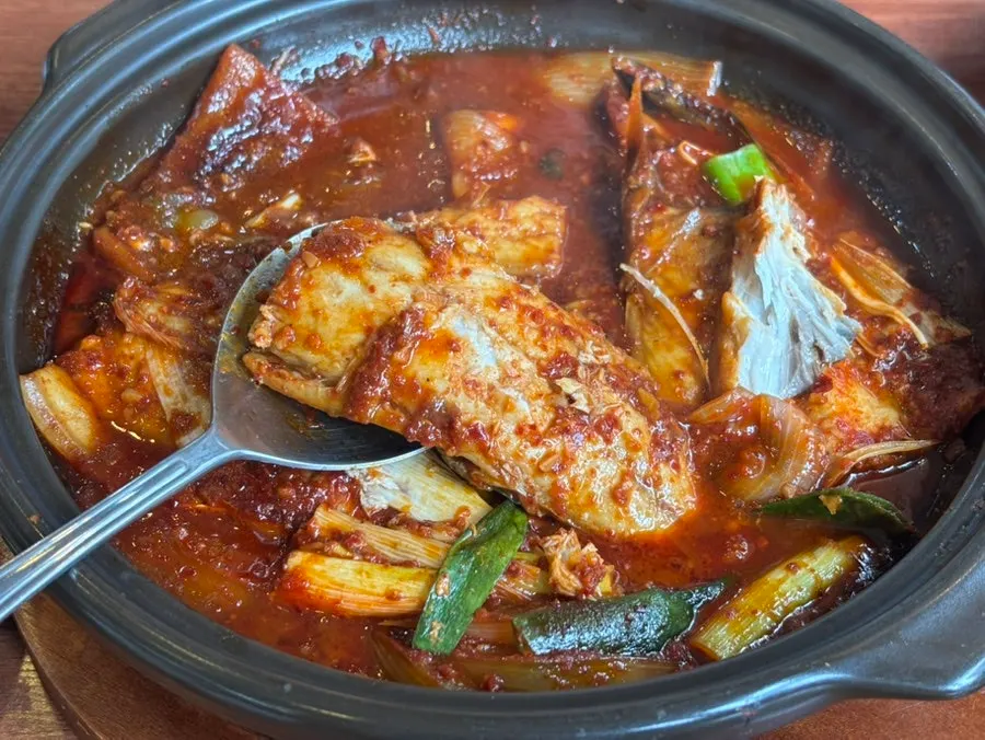 Stone-pot rice scooped into a bowl
