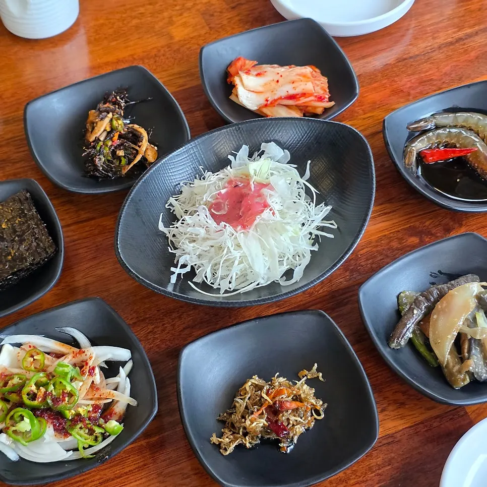 Side dishes beginning to be served one by one