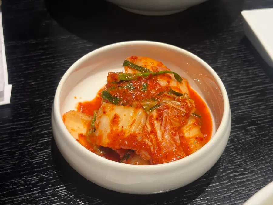 Cross-section of kimchi mandu with a thin wrapper