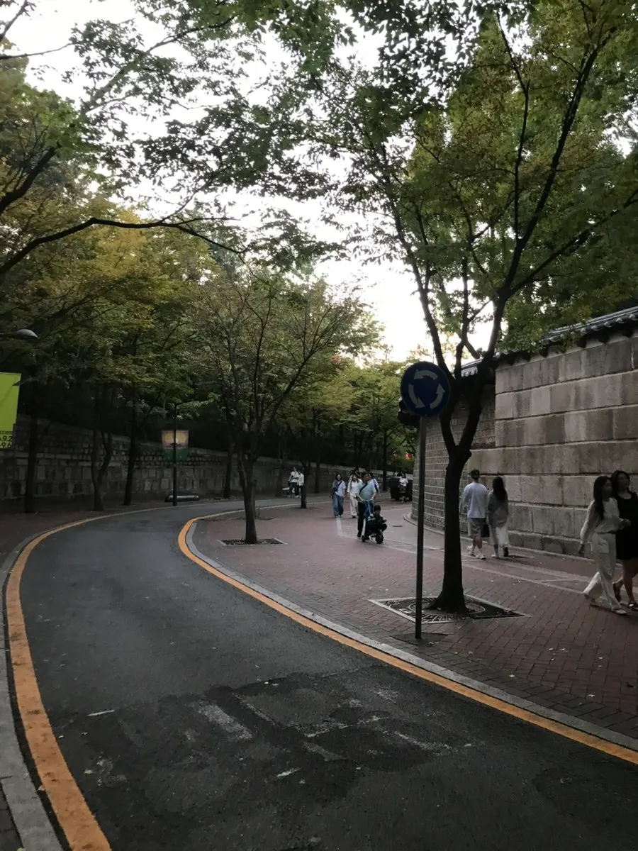 Crowded evening scene on Jeongdong-gil
