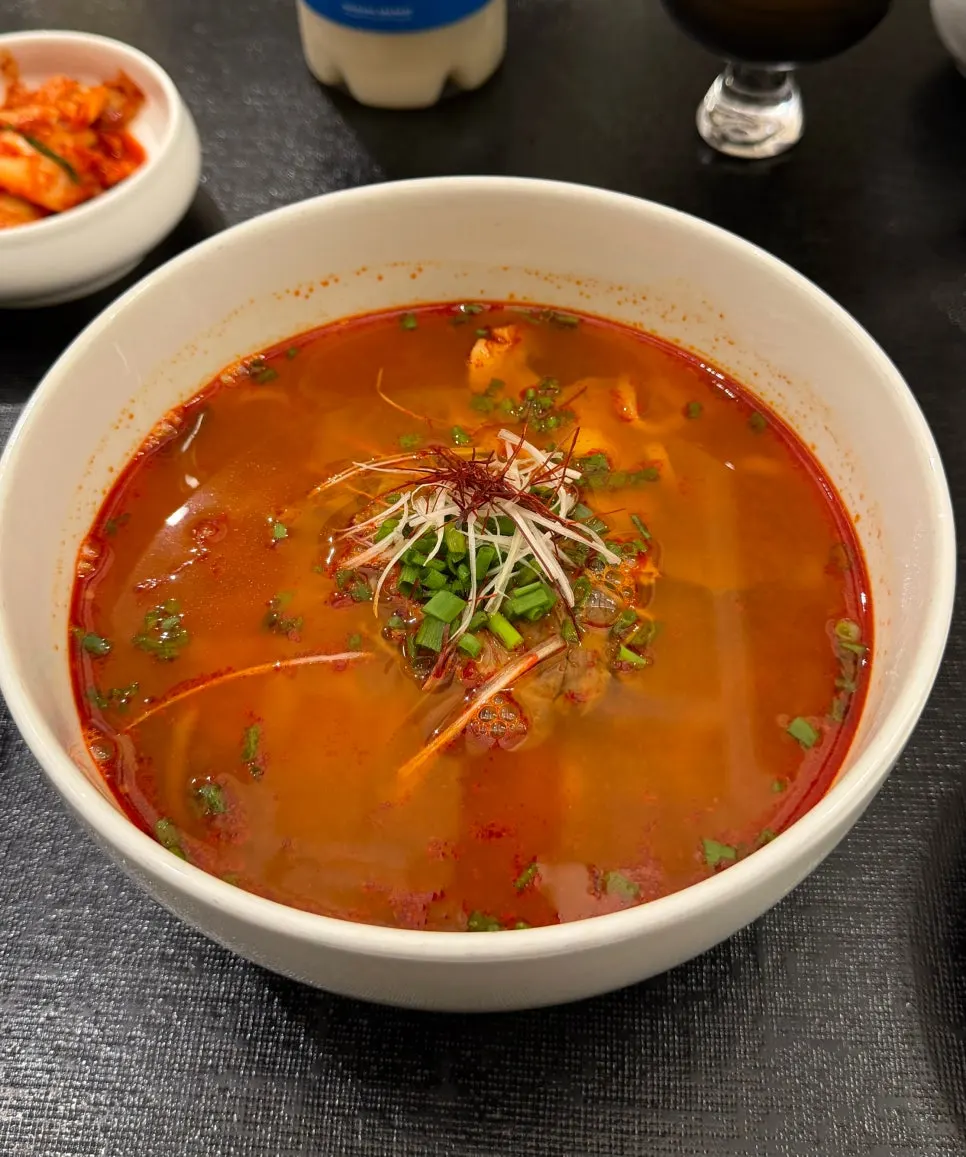 Tanbaek's spicy yukgaejang kalguksu with a bold broth