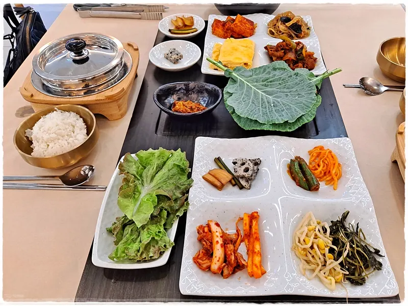 Hearty table spread filled with self-serve bar side dishes