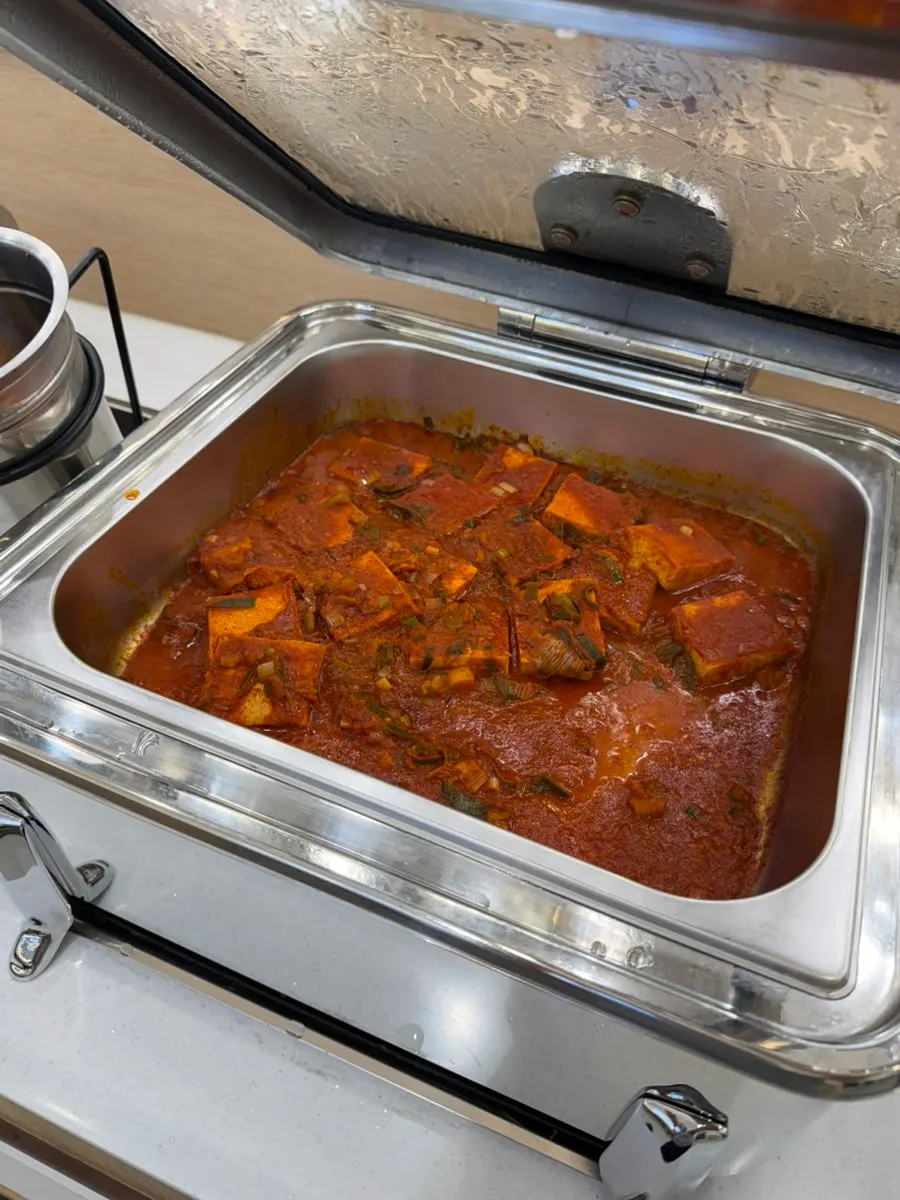 Pork stir-fry prepared at the self-serve bar