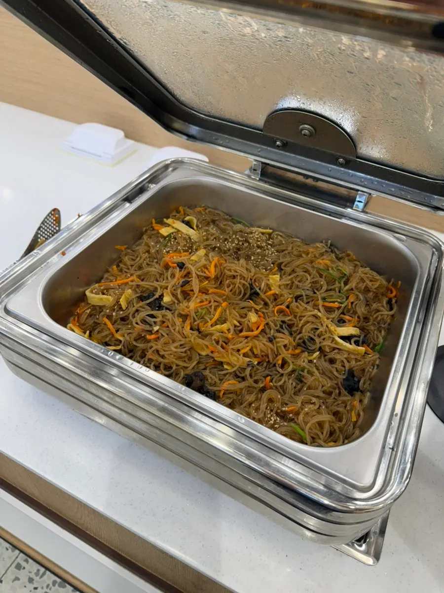 Various banchan lined up at the self-serve bar