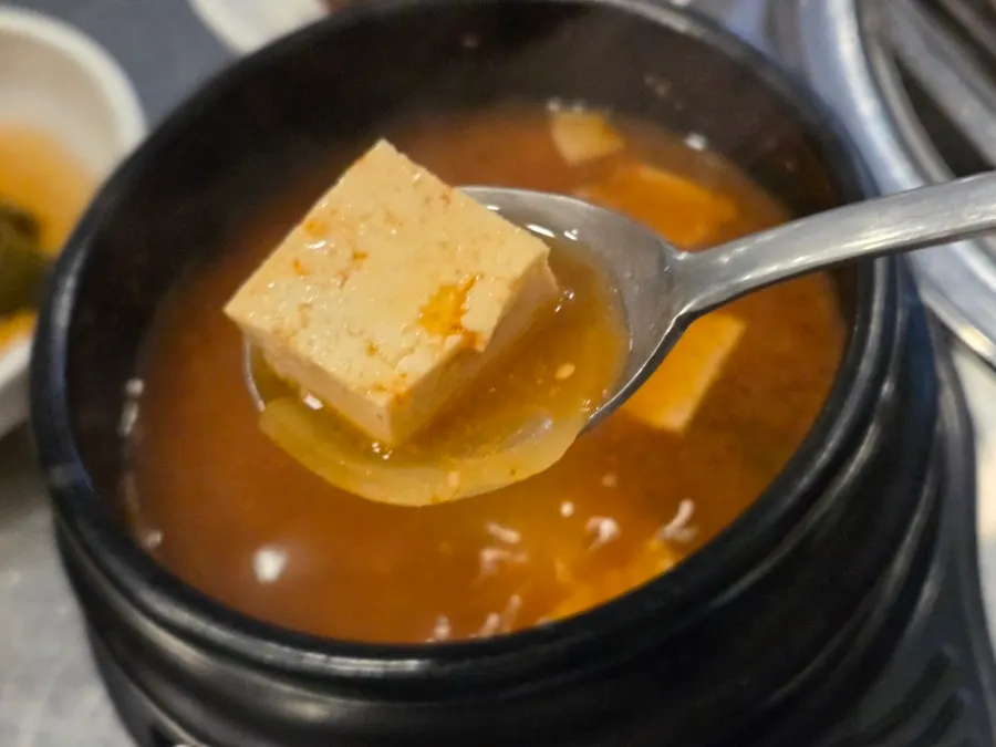 Pot of complimentary crab doenjang stew