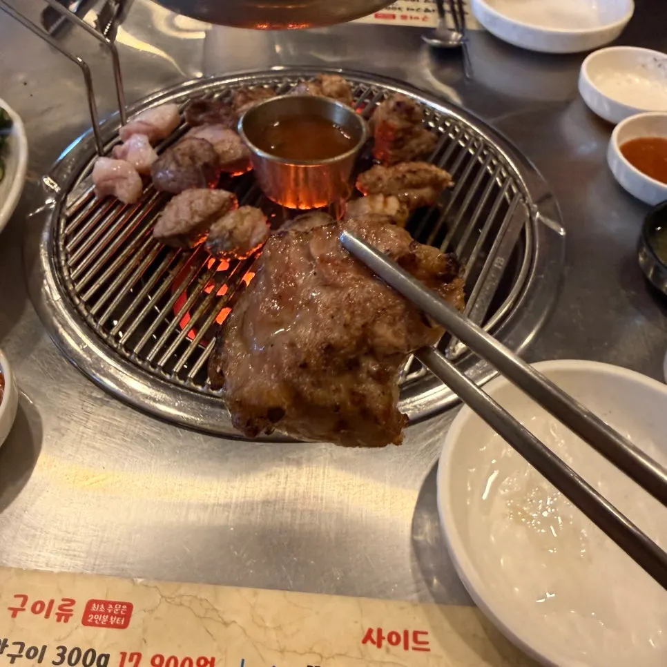 Selected pork neck pre-grilled over charcoal