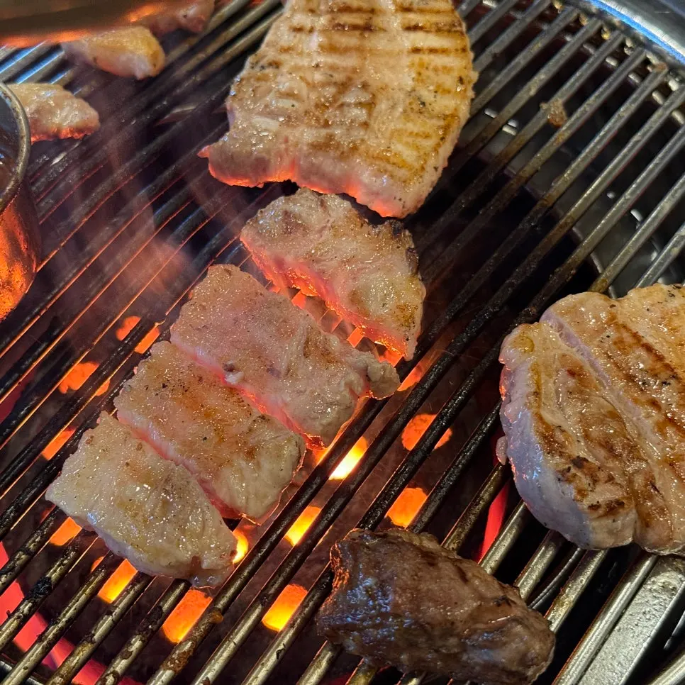 Selected pork belly on the charcoal grill