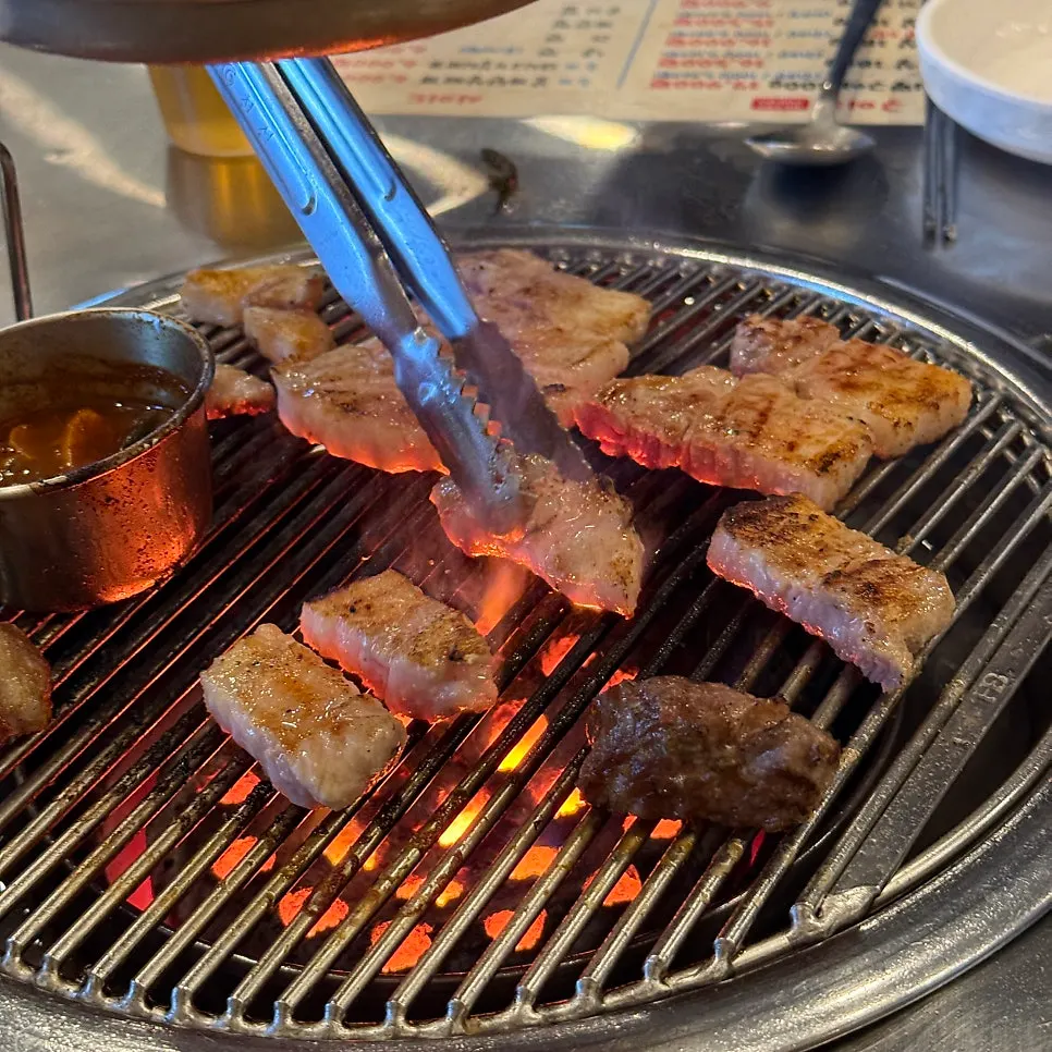 Pork belly and pork neck together on the grill