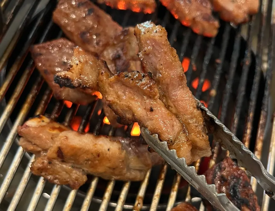 Close-up of charcoal-grilled marinated pork ribs