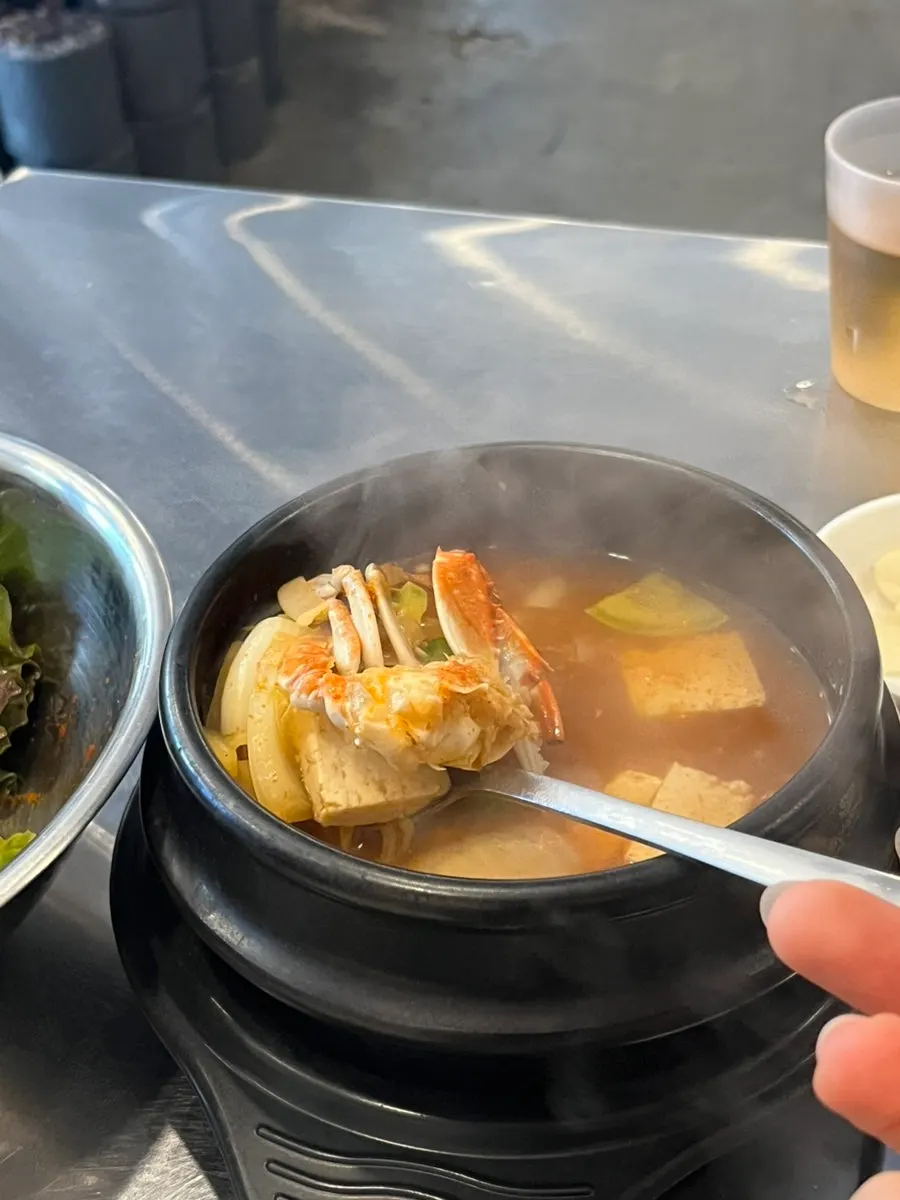 Pork belly sizzling on the grill