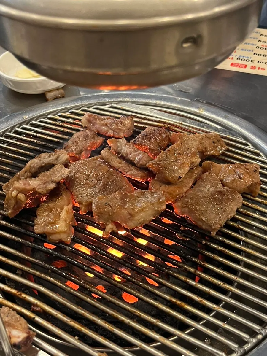 A bowl of doenjang stew enjoyed alongside the meat