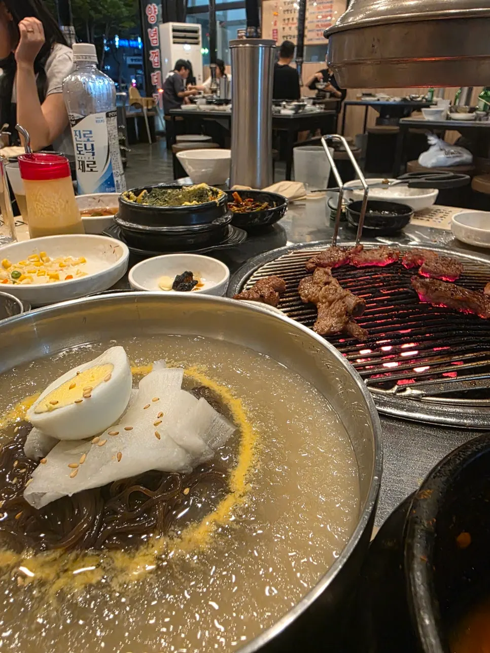 Noodles lifted from the mul-naengmyeon broth