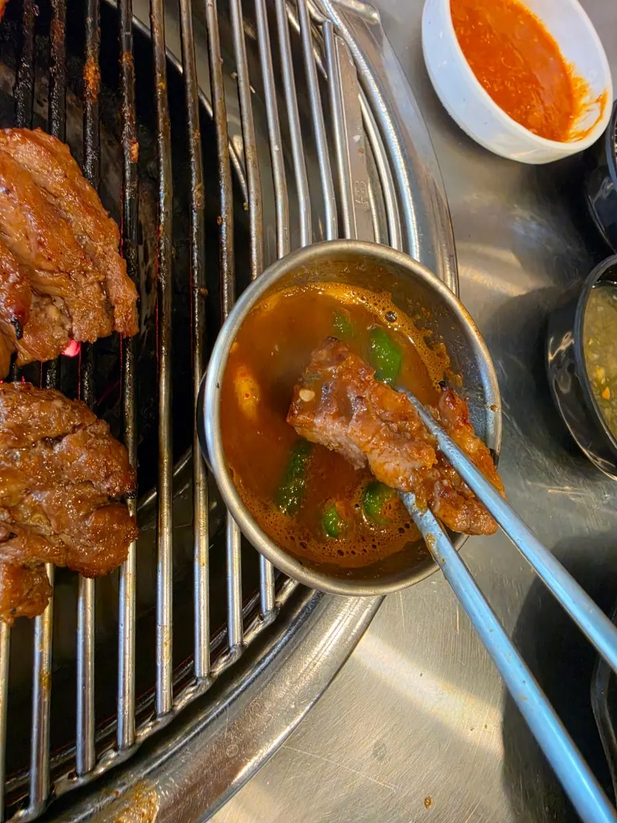 A cut piece of marinated ribs fully cooked
