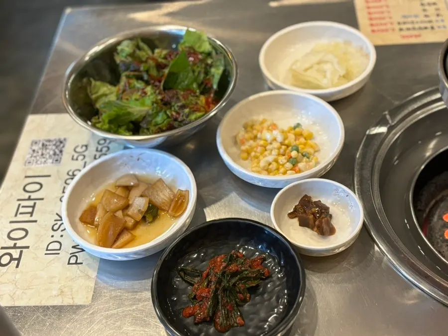Table with charcoal grill brazier at Tannae Paju Main Branch