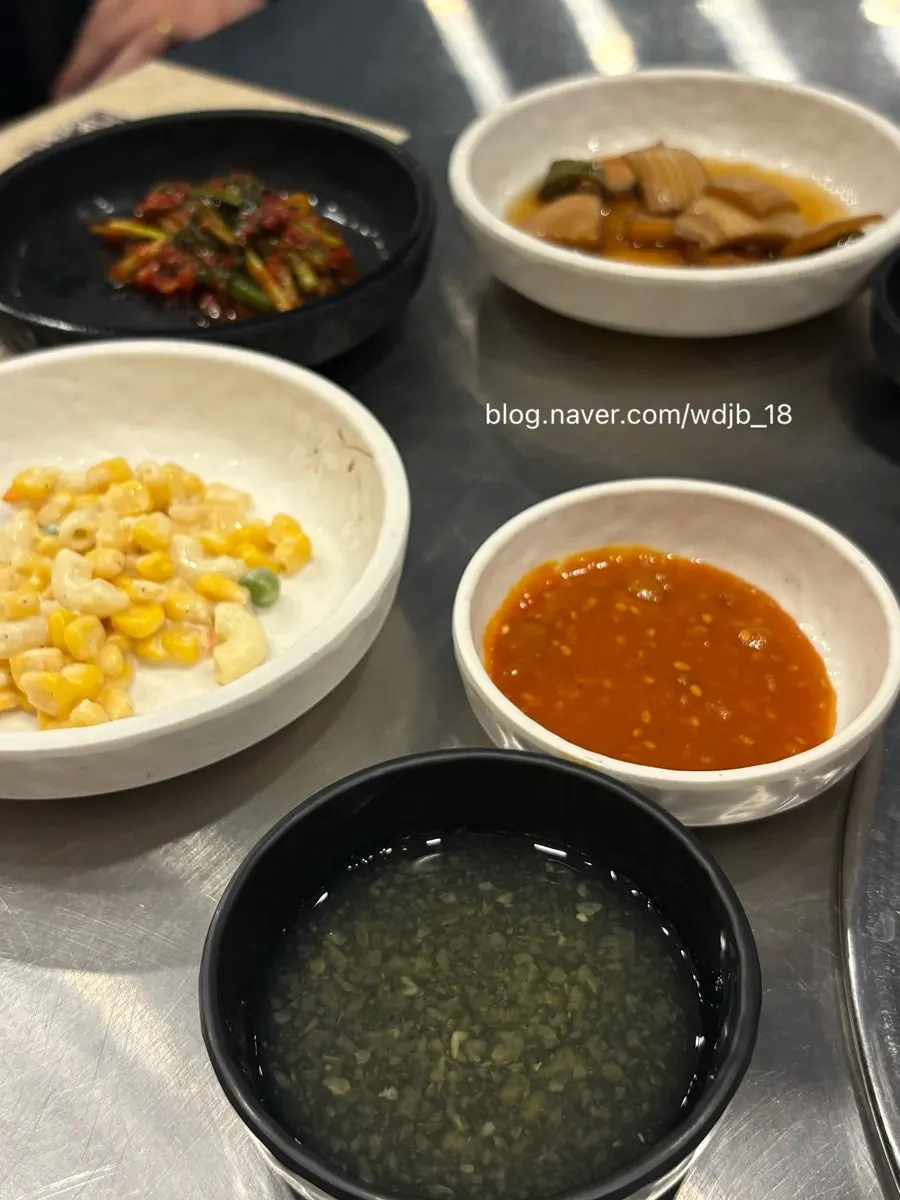 Sauce plates served alongside the meat