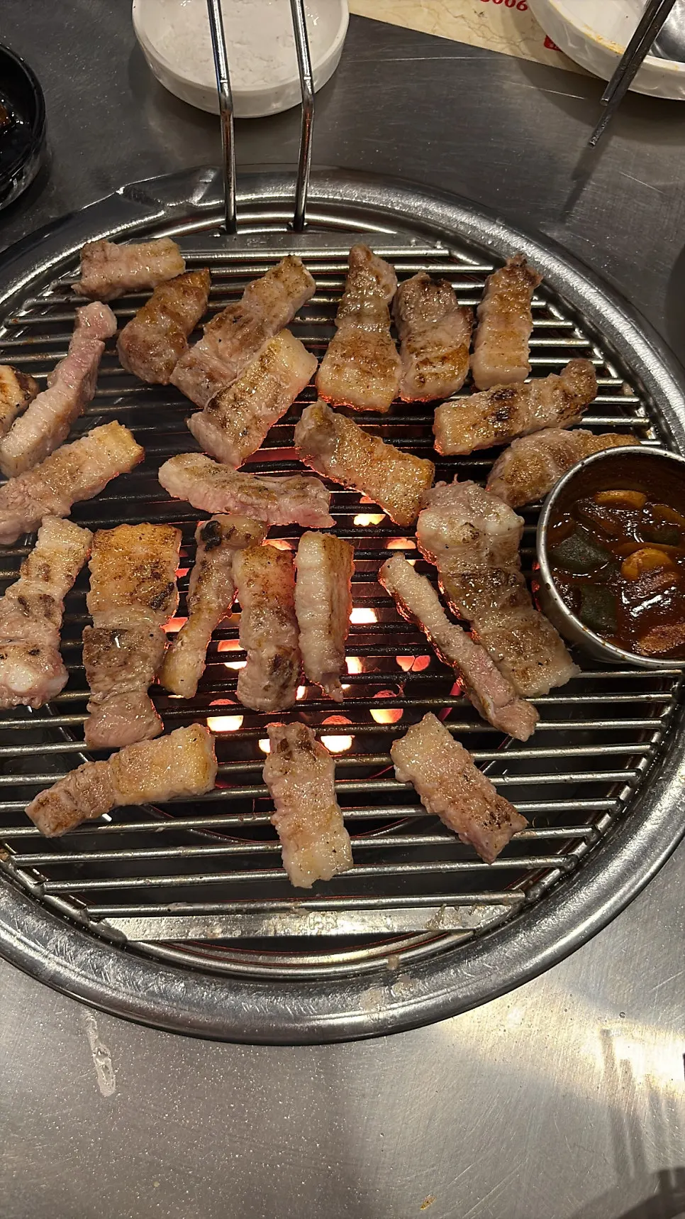 A golden-brown piece of grilled pork belly