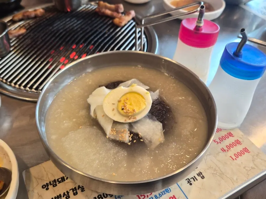 Dessert naengmyeon with fine ice shavings floating on top