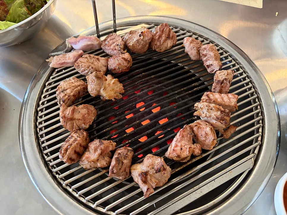 Grilling the pre-grilled pork neck