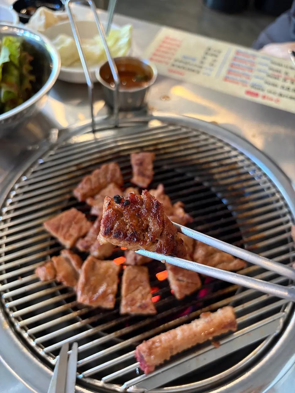 A soft piece of marinated giant pork skewer