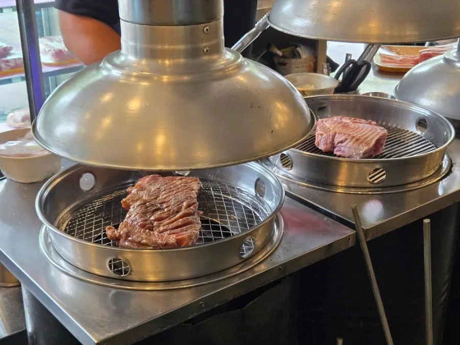 A plate of marinated pork king grill cuts