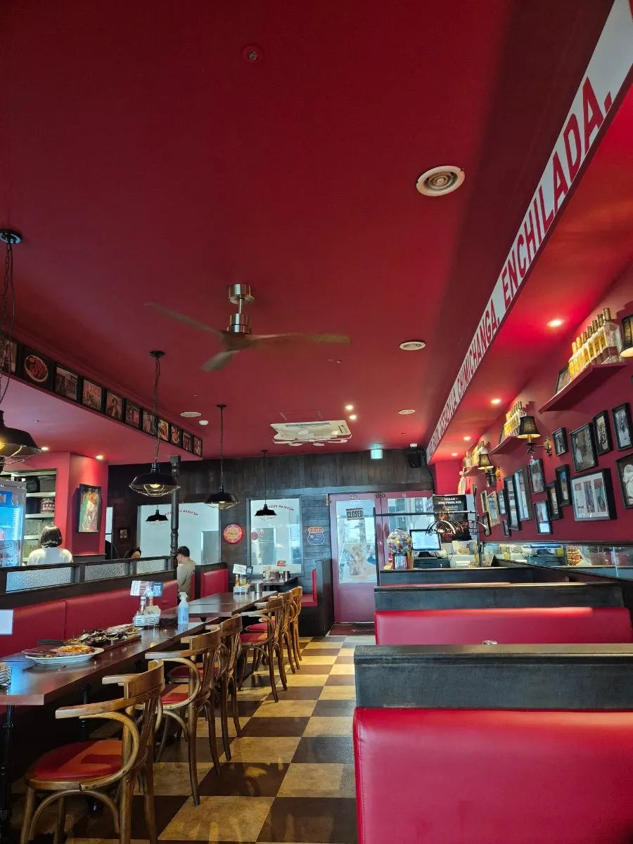 Inside Taqueros with its red-colored interior