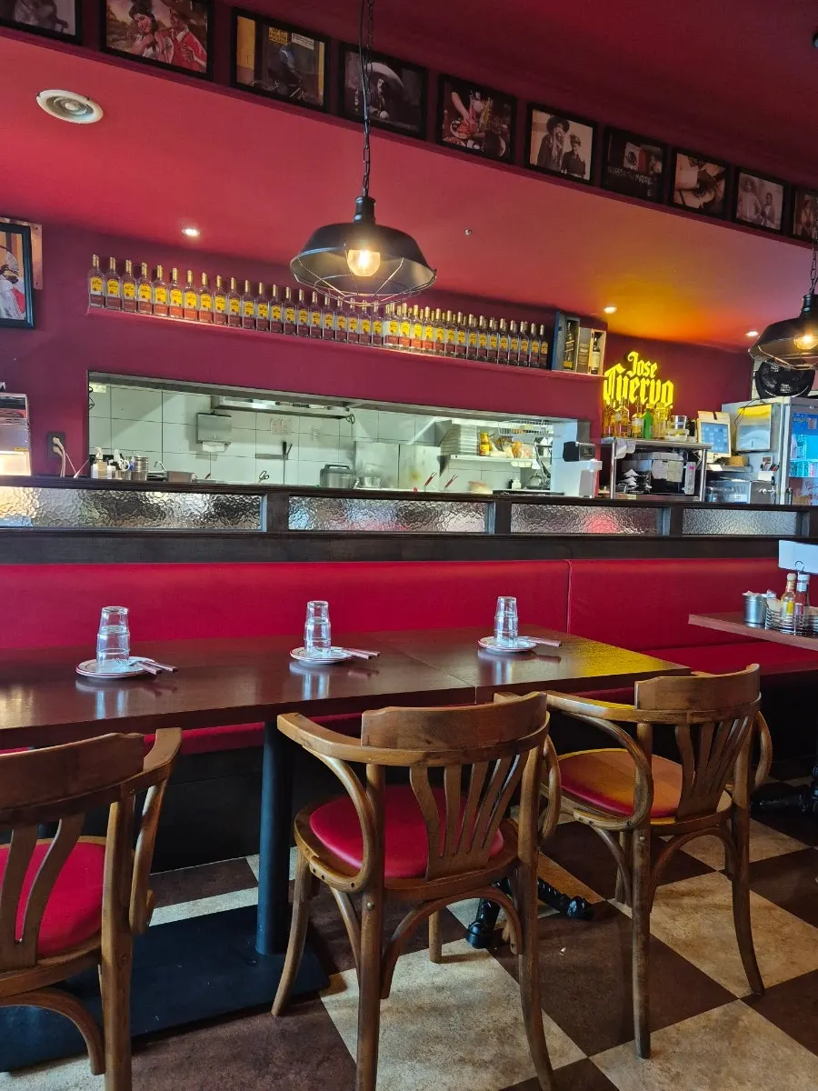A four-person table seat at Taqueros