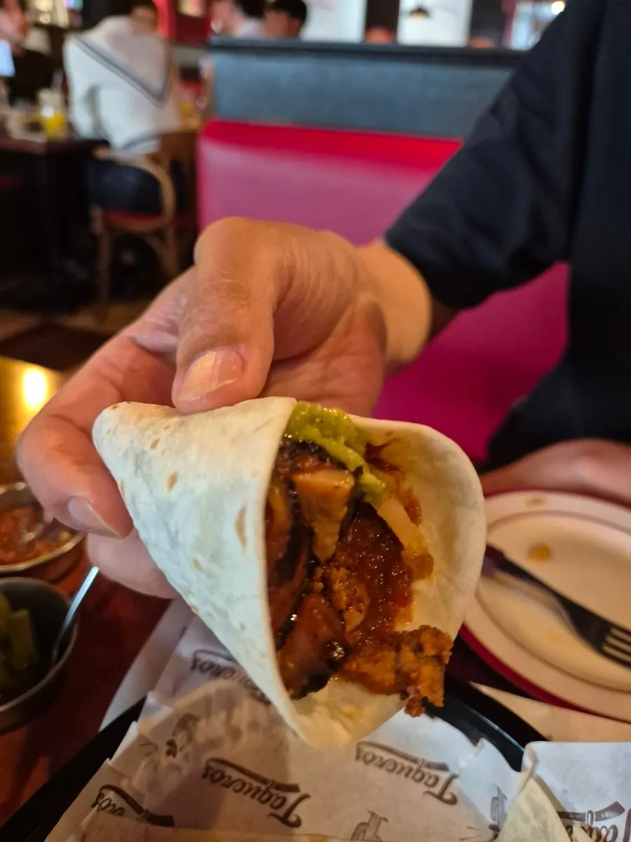 Tortilla topped with guacamole