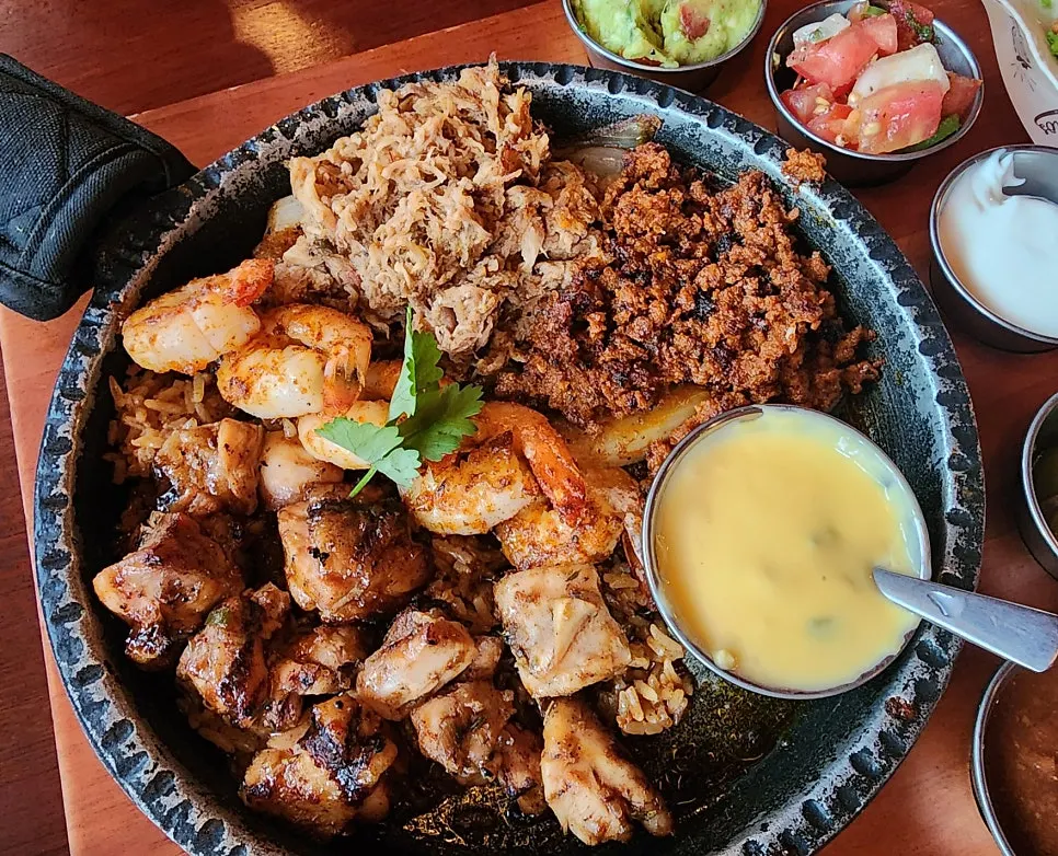 Generous portion of meat and shrimp on the platter