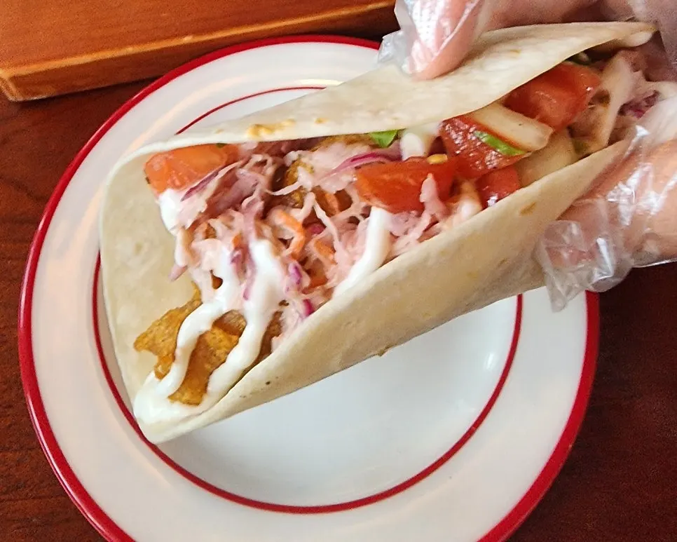 Wrapping a fajita in a tortilla