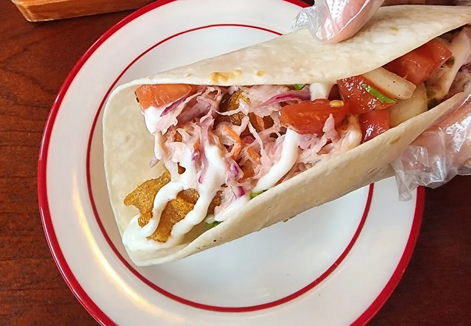 Fajita tortilla topped with chicken and shrimp
