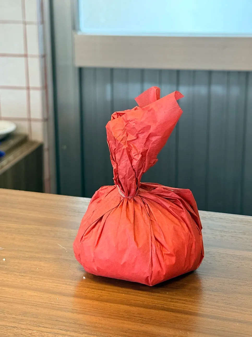 Three wrapped mochi received for takeout