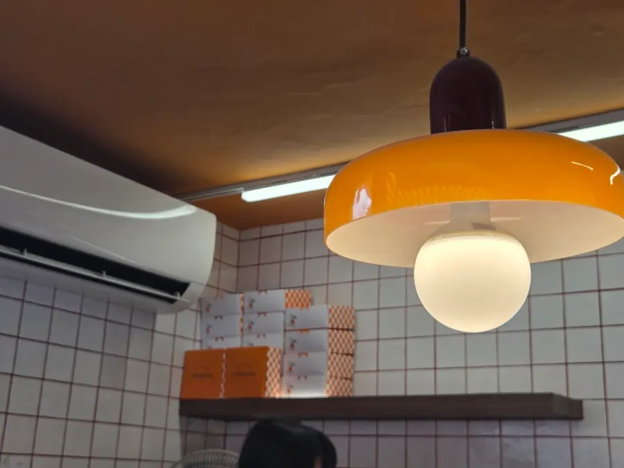 Orange-themed interior of Tareudang