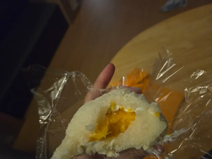Cross-section of a mango mochi packed with fruit