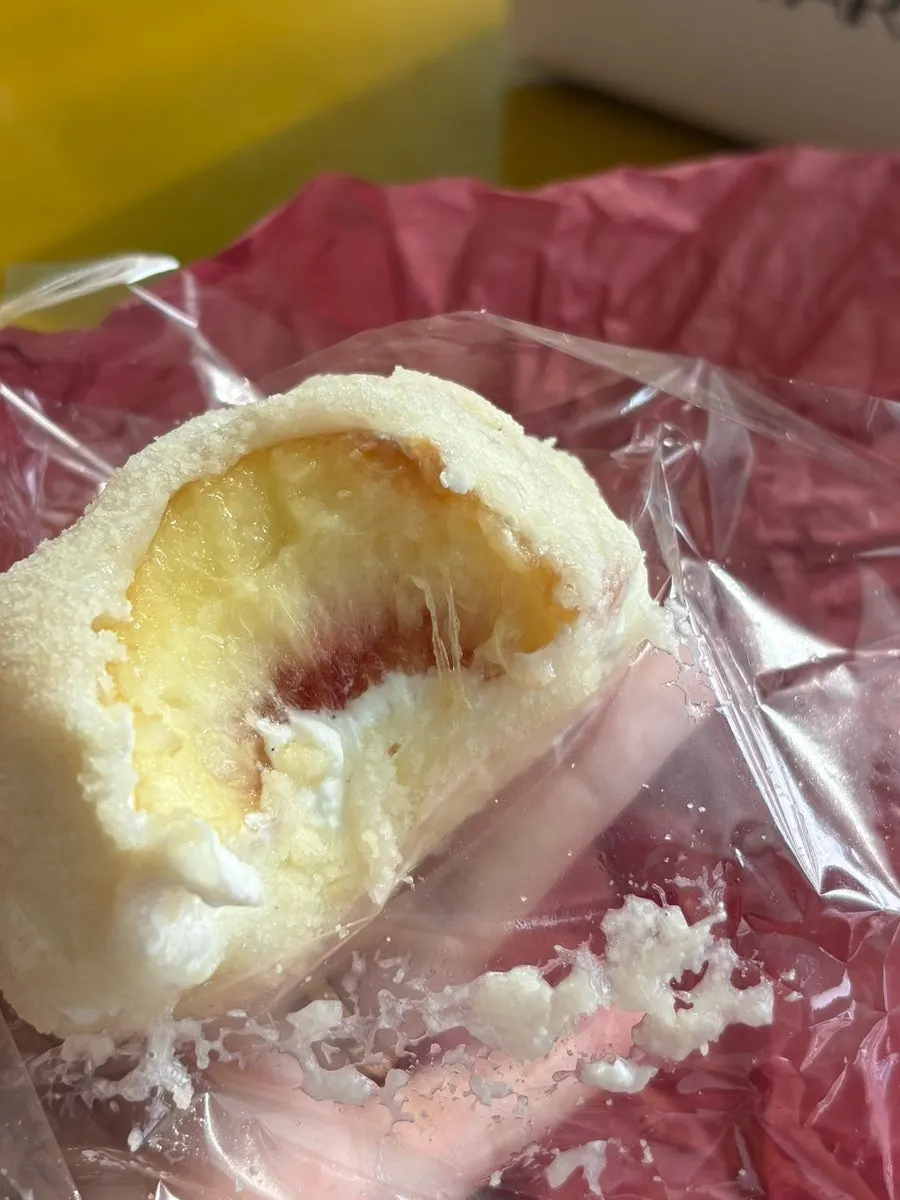 Peach flesh visible inside the yogurt mochi