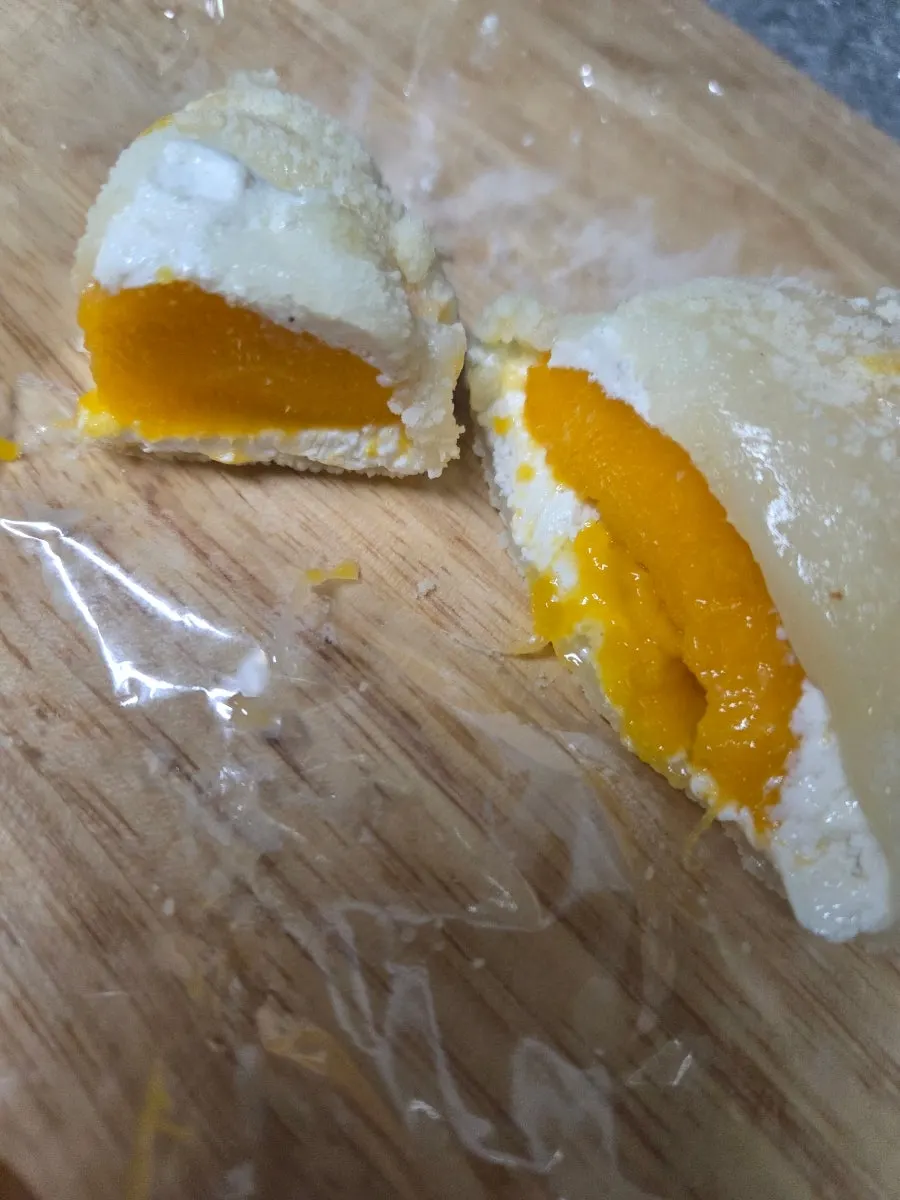 Cross-section of the yogurt mango rice cake cut in half