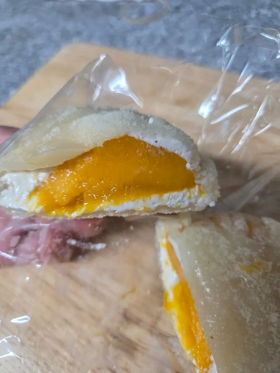 Inside of the rice cake showing mango and yogurt cream