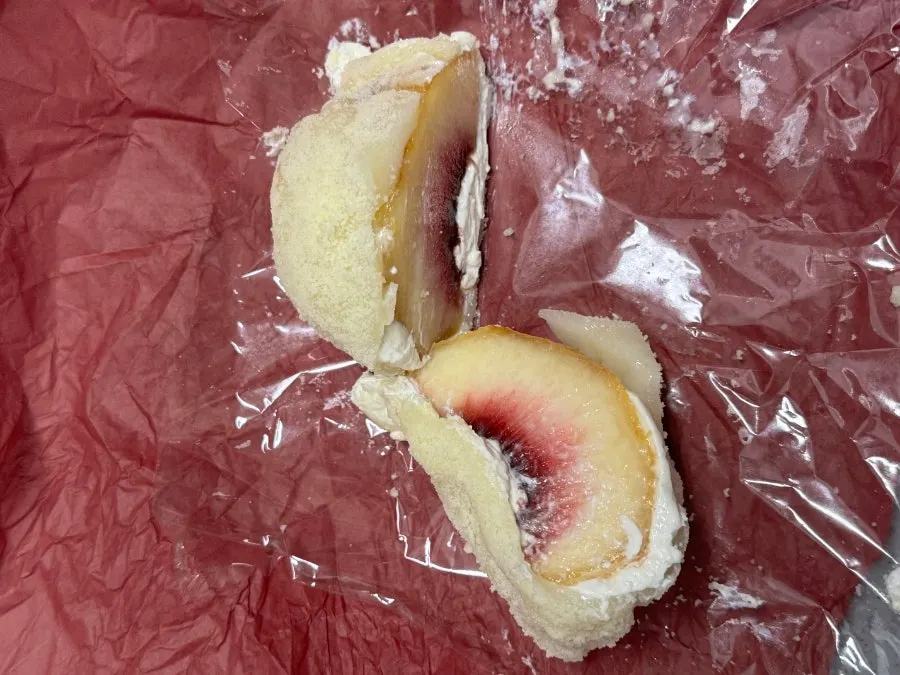 Yogurt peach rice cake with a whole peach inside