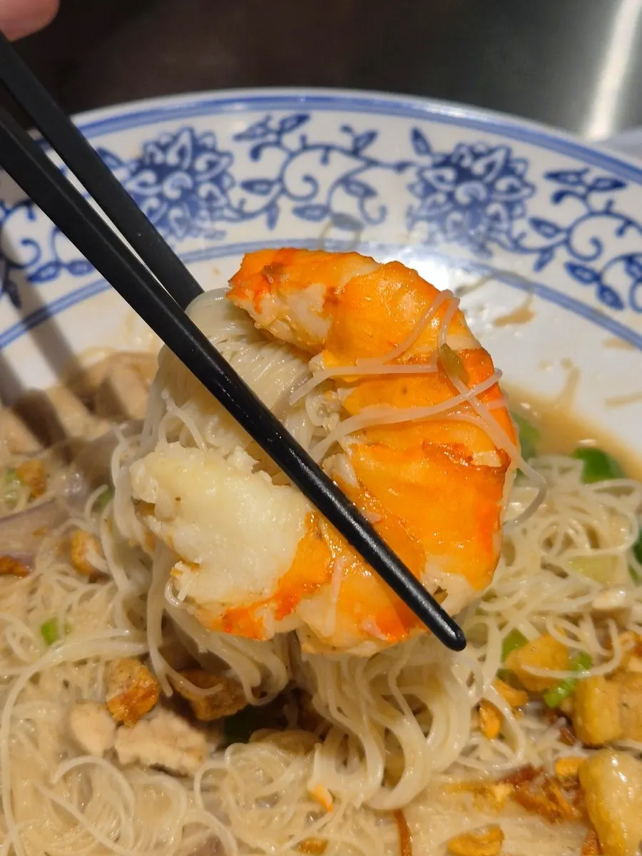 Close-up of the whole red king prawn on top