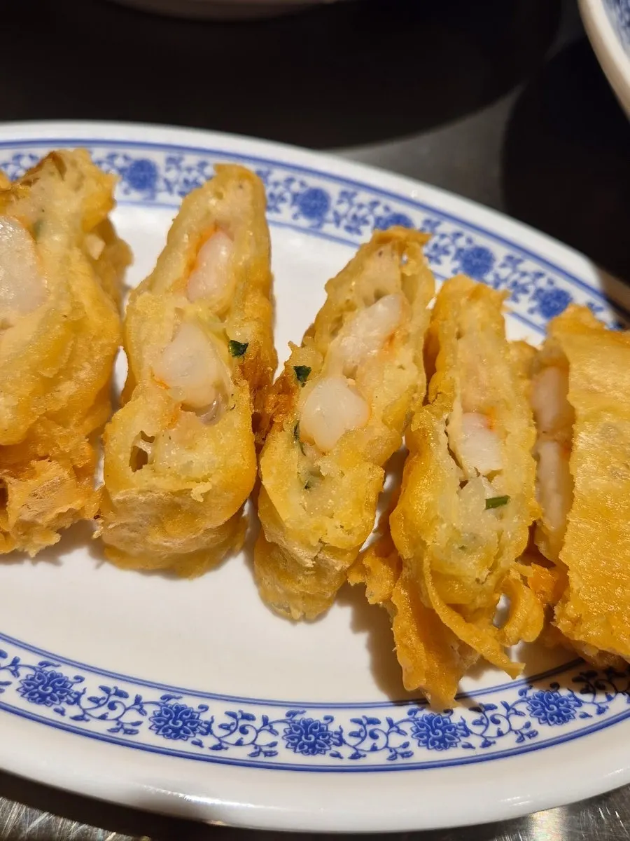 The crispy exterior of the fried shrimp rolls