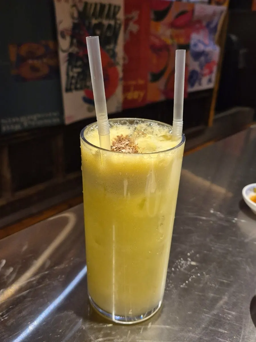 Close-up of the green apple juice glass