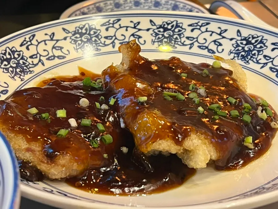 Two large pieces of black vinegar guobaorou