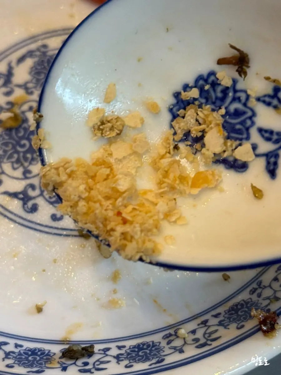 Close-up of plump king prawns topped with cereal crumbs