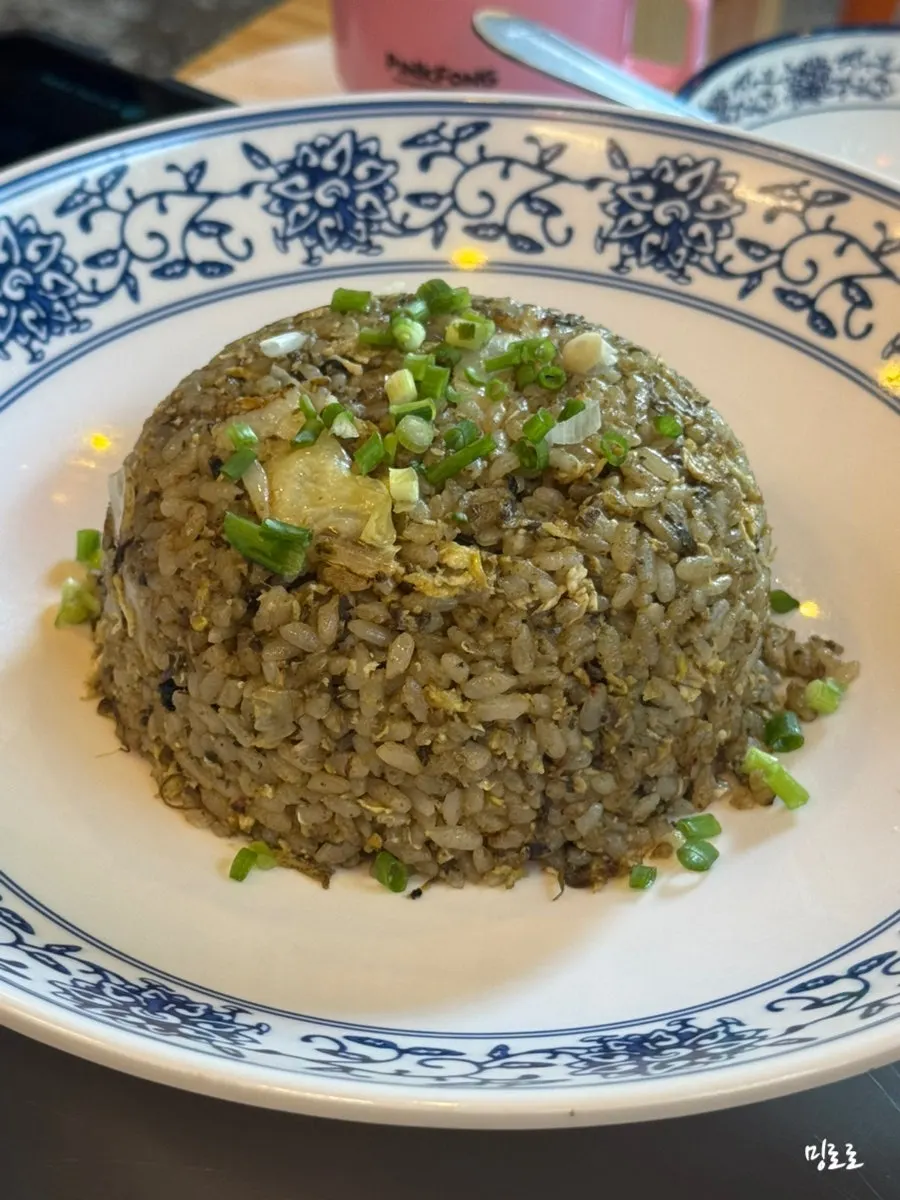 A plate of garlicky stir-fried morning glory