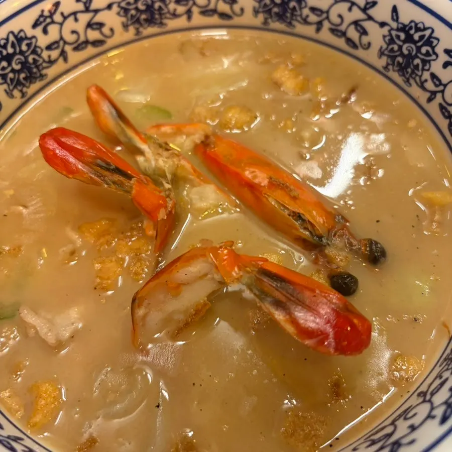 Close-up of the rich shrimp gukbap broth