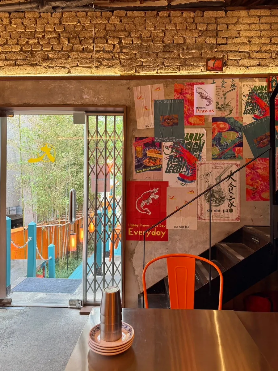 Outdoor seating area at Ttasijia Yeonnam