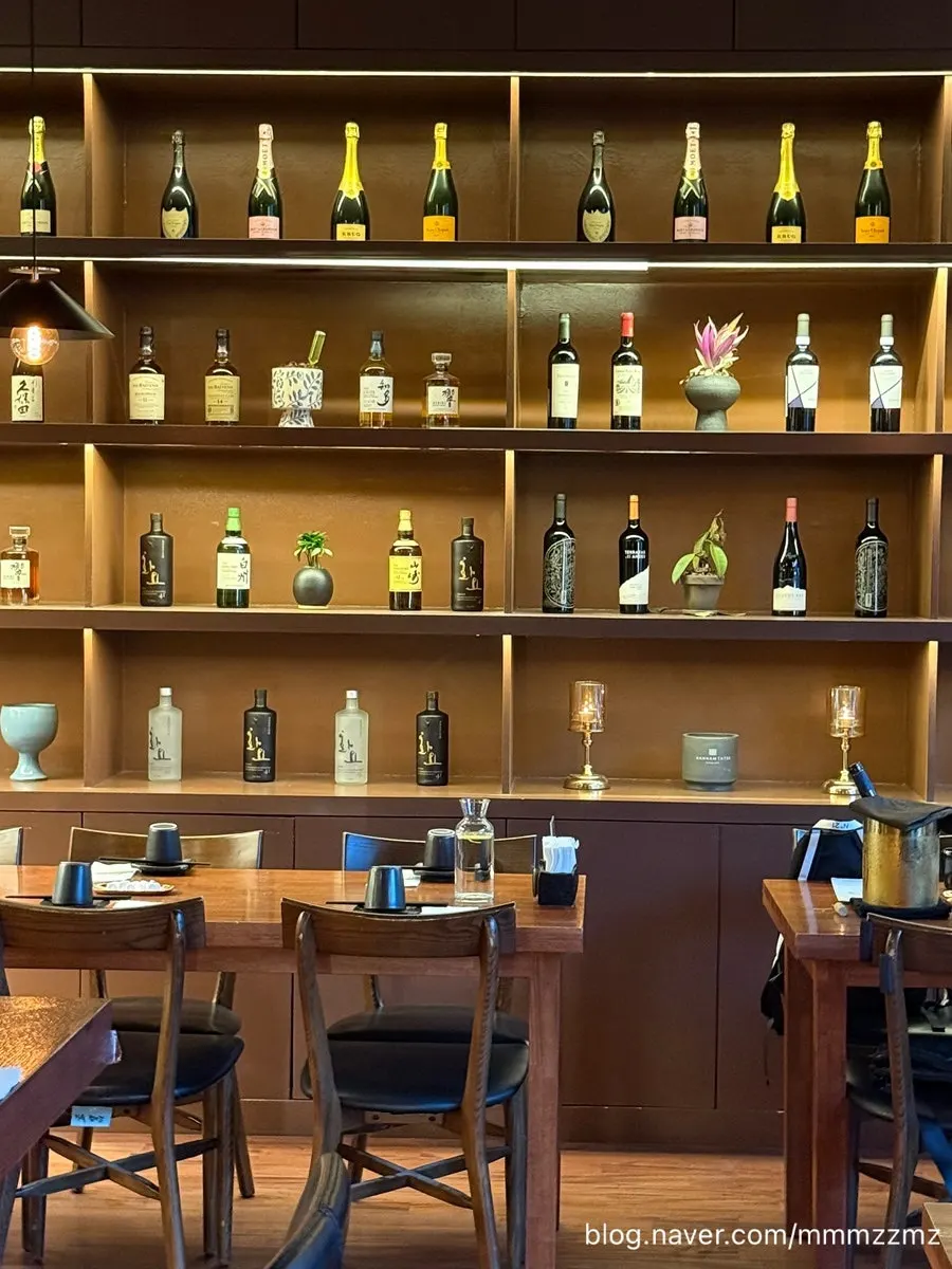 Bar seats facing the open kitchen