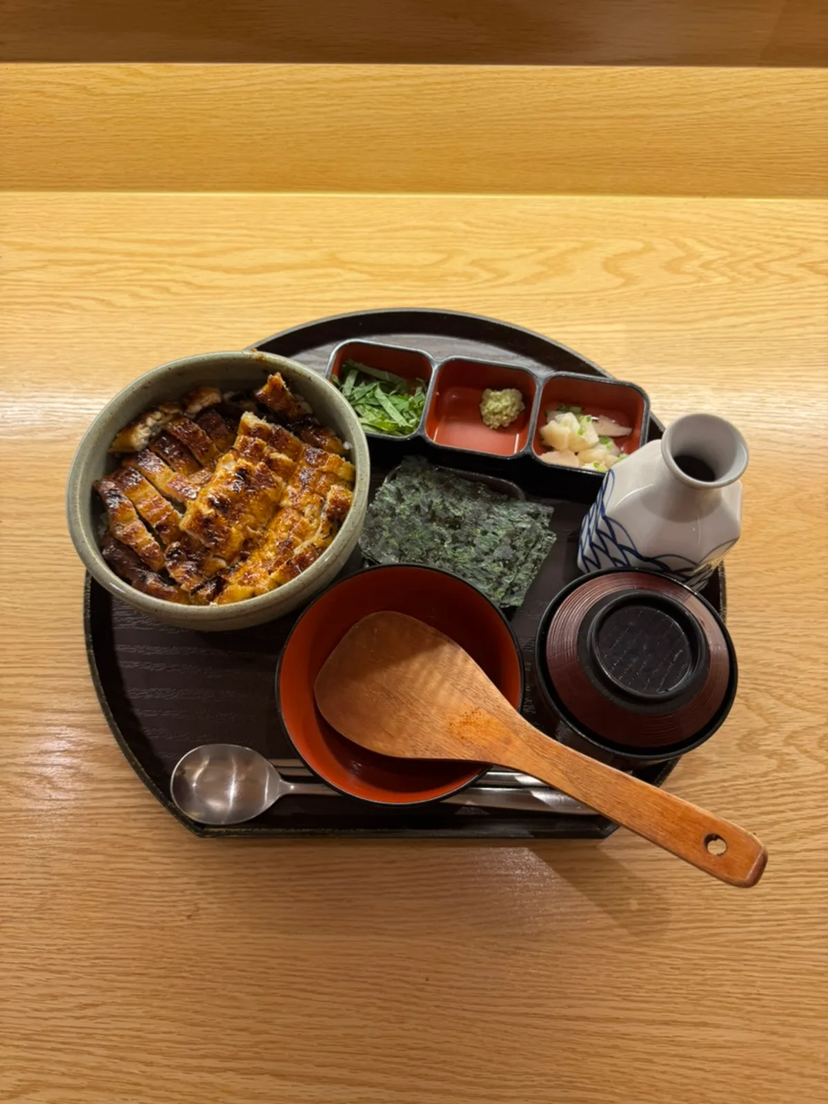 Full table setting of hitsumabushi eel rice bowl at Tawa, a Japanese restaurant near City Hall Station